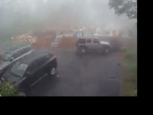 Security Camera Captures Tree Falling During Storm in New Hampshire