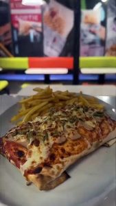French tacos gratinated with bacon, olives, and fries #BR3 #foodlover #tacos #TacoTime #delicious