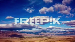 time lapse - beautiful cloudscape moving over mountain range and the valley